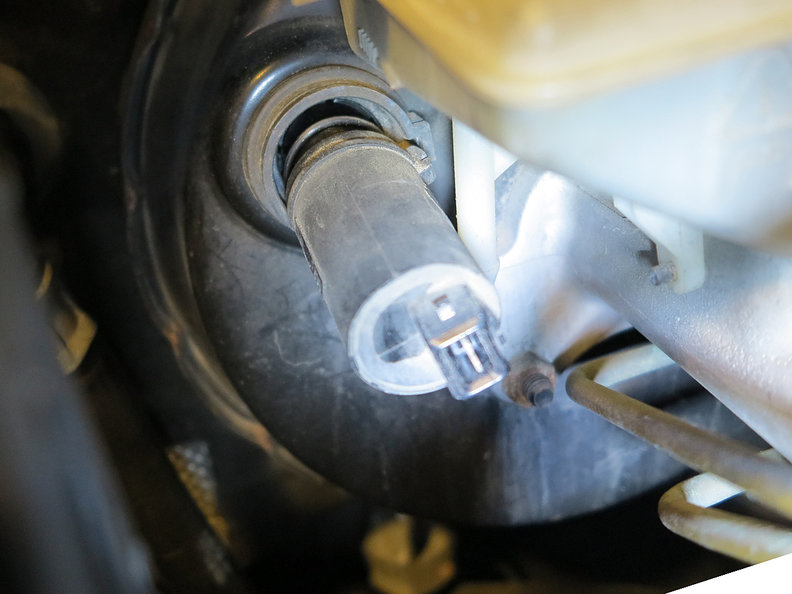 Brake pedal sensor at brake booster