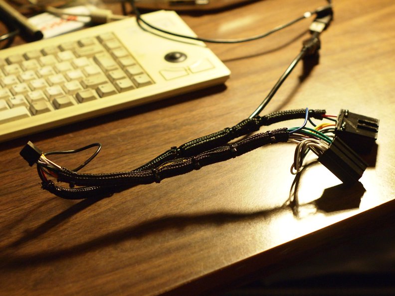Wiring harness, loomed up with Techflex. Note the branch on the top right, which now goes to a powered USB port.