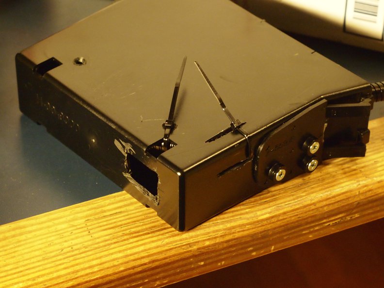 not so clean....I wish I'd had a drill for this, so I could drill holes for the zip ties instead of cutting them. I did melt some holes with a grinding stone, but it's not really a nice way to do it.