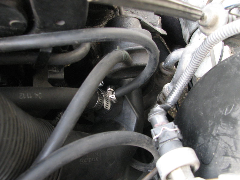 PTC nipple with the original induction tube with 5/8" heater hose.