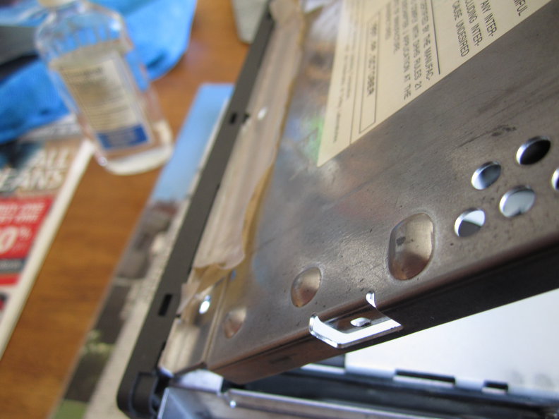 Raising top cover from rear of unit