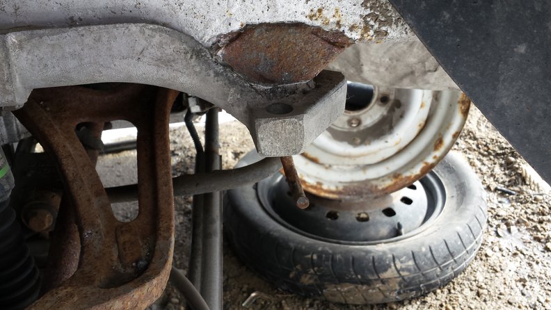 LH rear. If you look at the right side you can see the corrosion crater