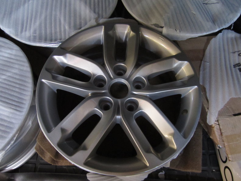 Re-finished powder-coated wheels