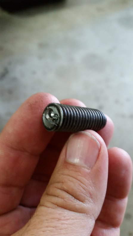 Broken head bolt stub.