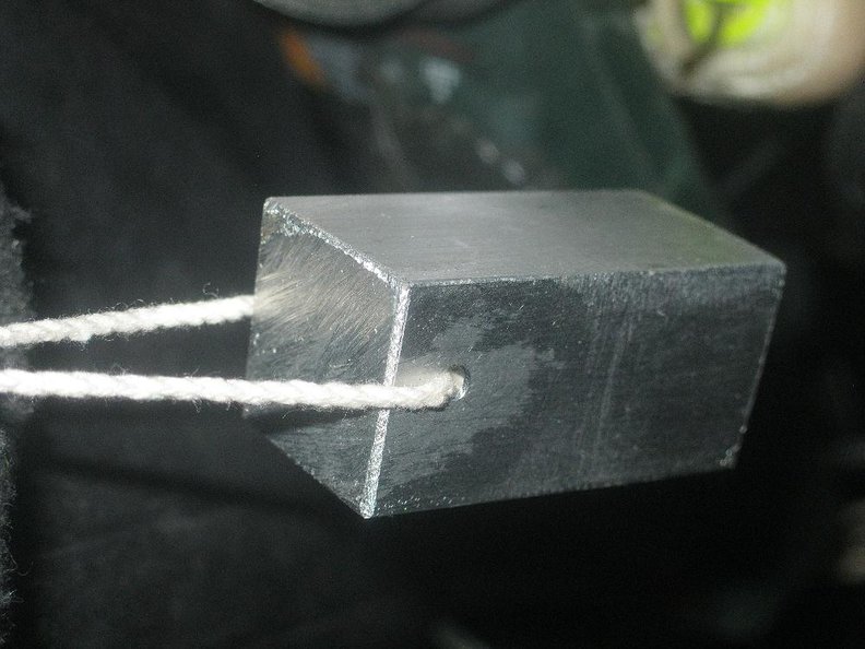 Tool made from 3/4 inch square aluminum bar stock slightly filed down.