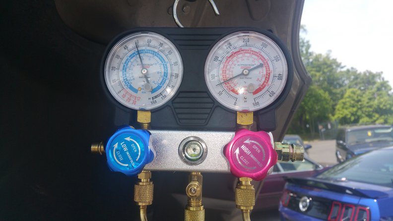 After letting out some refrigerant to bring low side down from 80psi