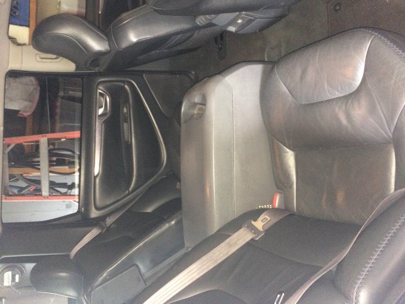 Theres the fridge! I have the middle seat that goes there too.