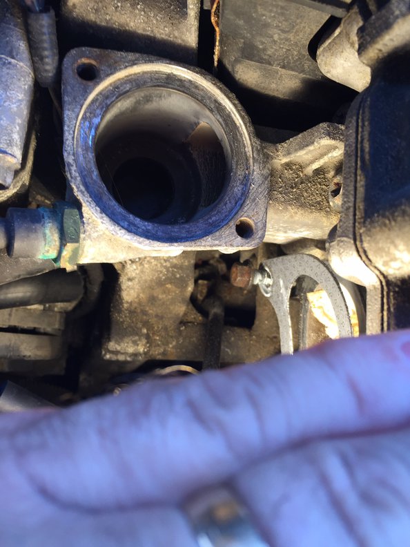 Just to left of the manifold bolt is the missing bolt