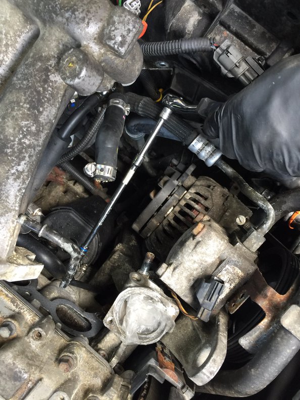 Ready to tighten clamp on oil box