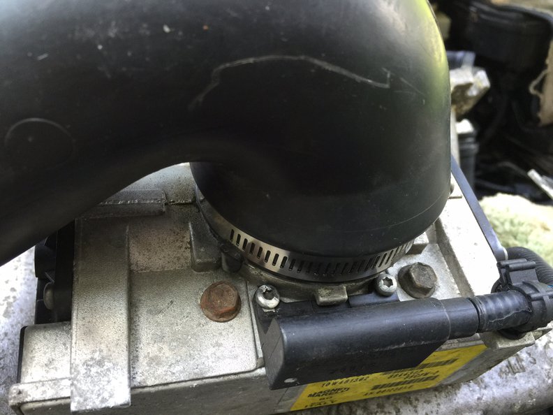 Lug on ETM locates correct position for induction pipe