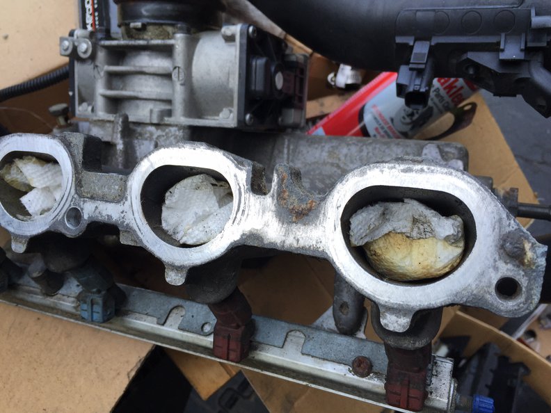 Little bit of gasket to clean off to make this 2.5 rivers clean