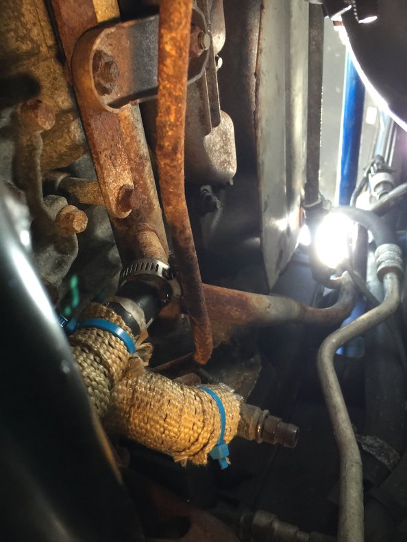 Look how nicely the PS line holds the hose clamp out of the way while you push the hose on the upper fitting...