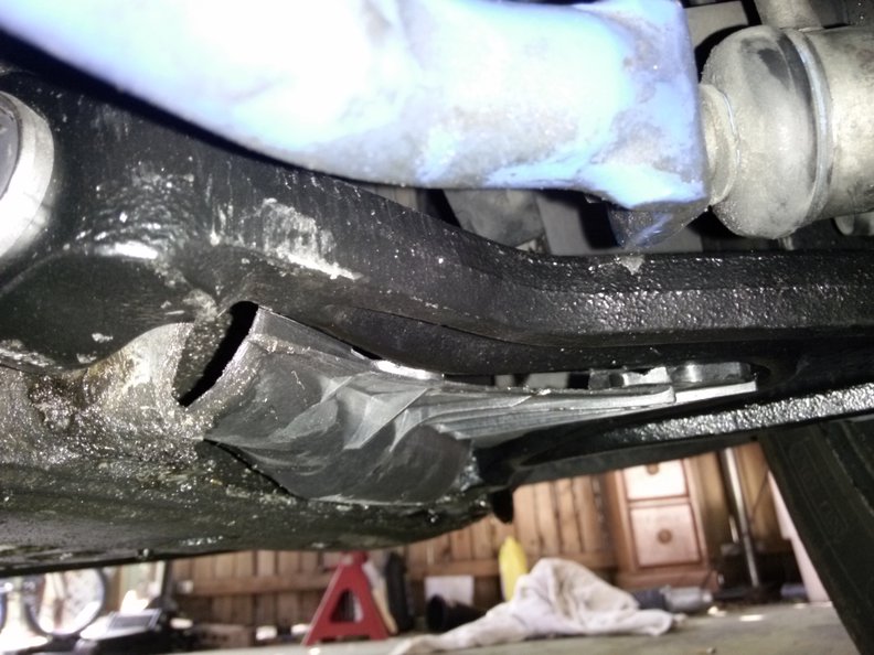 You can see the rub marks on the new control arm.