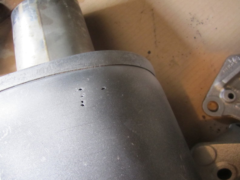 Muffler holes T409 stainless