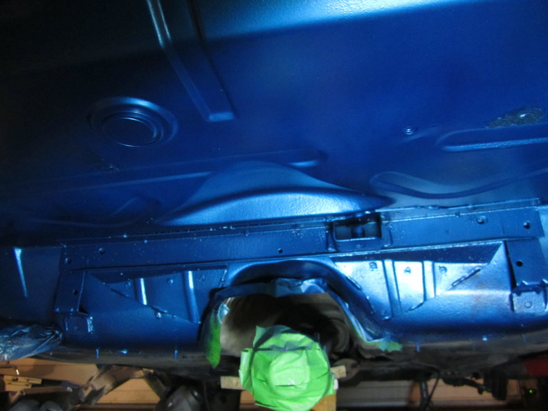 Under floor area behind rear foot wells