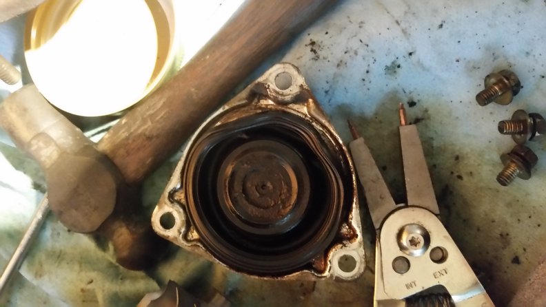 see the rubber ring around the outside, it was sucked in