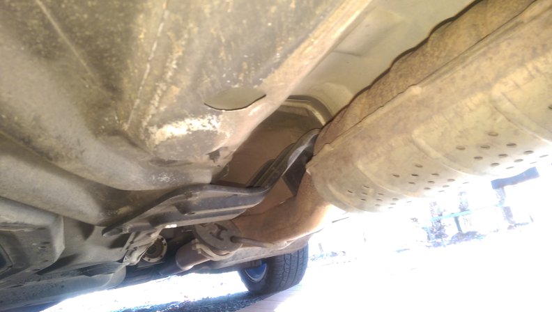 Carrier bearing bracket and Exhaust, Axle removed for repairs.