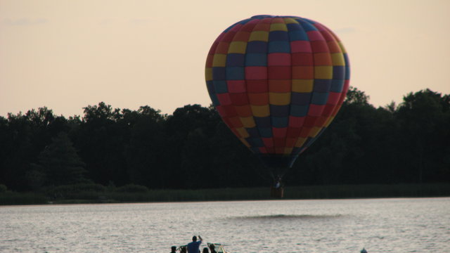 Touch and go by a hot air balloon for no apparent reason.