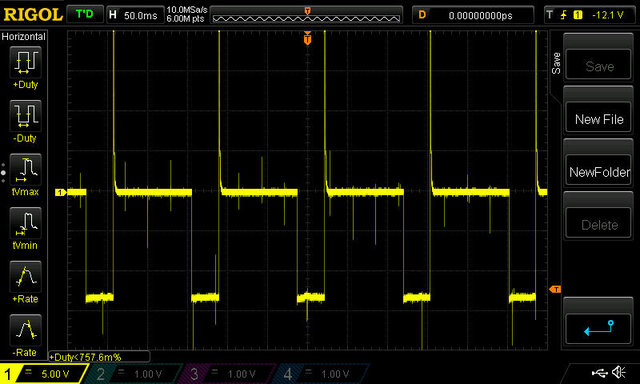 Scope probe on ECM's A39(+) and A42(- or signal ground). Looks like duty cycle is about 27% at -12 V. The period for each pulse was 130 millisec and the pulse is 35 millisec. Scope is at 5v/division and time is at 50 millsec/division.