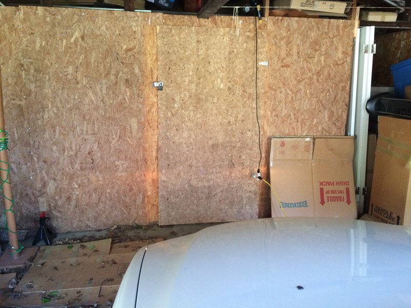 Actually seeing the headlights on the garage wall (a little)