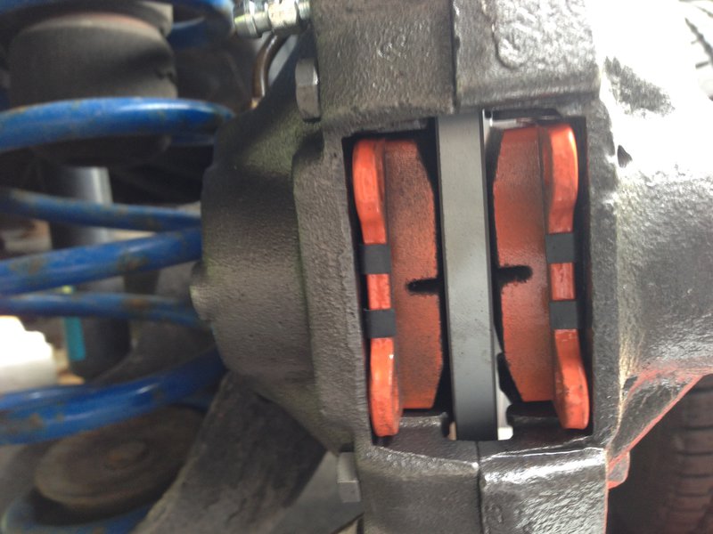 Empty caliper mounted and torqued