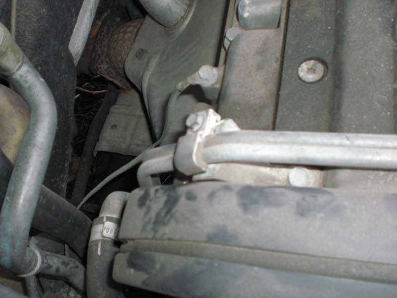 I guess the fuel lines are different on certain models b/c my Chilton manual told me to use two wrenches to disconnect them. Well, obviously I only needed to unscrew the bolt which holds them together. This takes an 8mm socket.