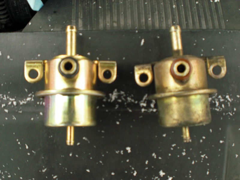 The new f.p.r. on the left and the old f.p.r. on the right. If this is the cause of my leak, the only thing I can think of is maybe the orange o-ring shrunk. Everything else looks ok.