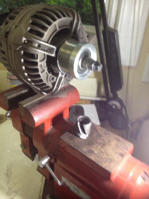 New alternator pulley installed with specialty tool