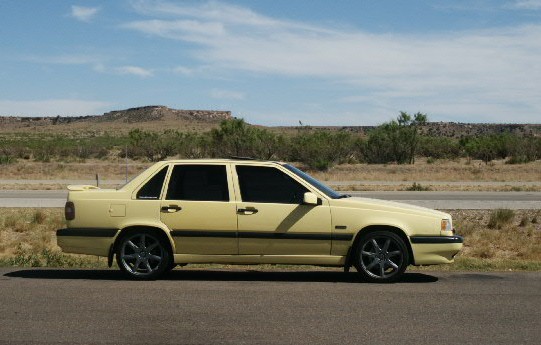 Yellow Volvo 850 T-5R on I-40