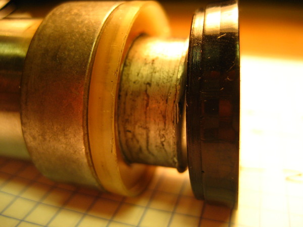 Cup seal on ram.  Note step in seal.