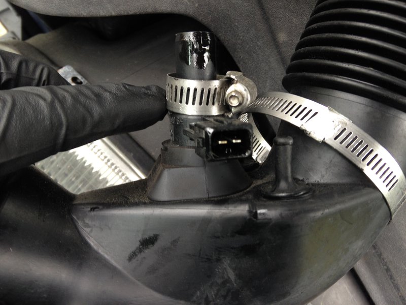 Make sure clamp isnt compressing plastic boss instead of soft pipe