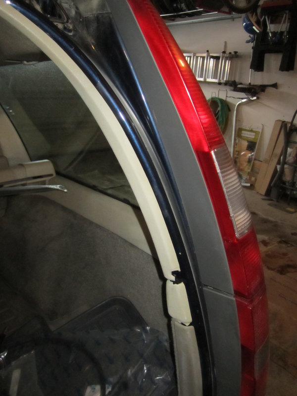 Ends of broken panels RHS cargo area