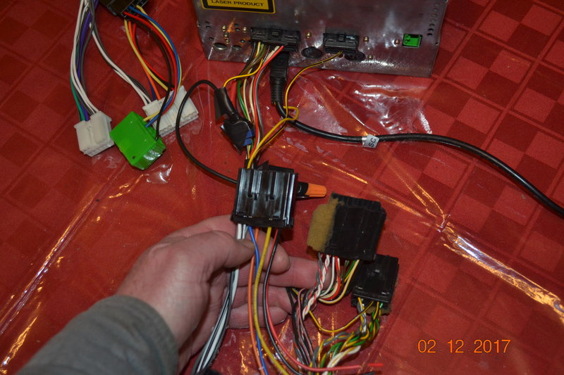 Volvo plug on right from 200 watt amp has more wires?