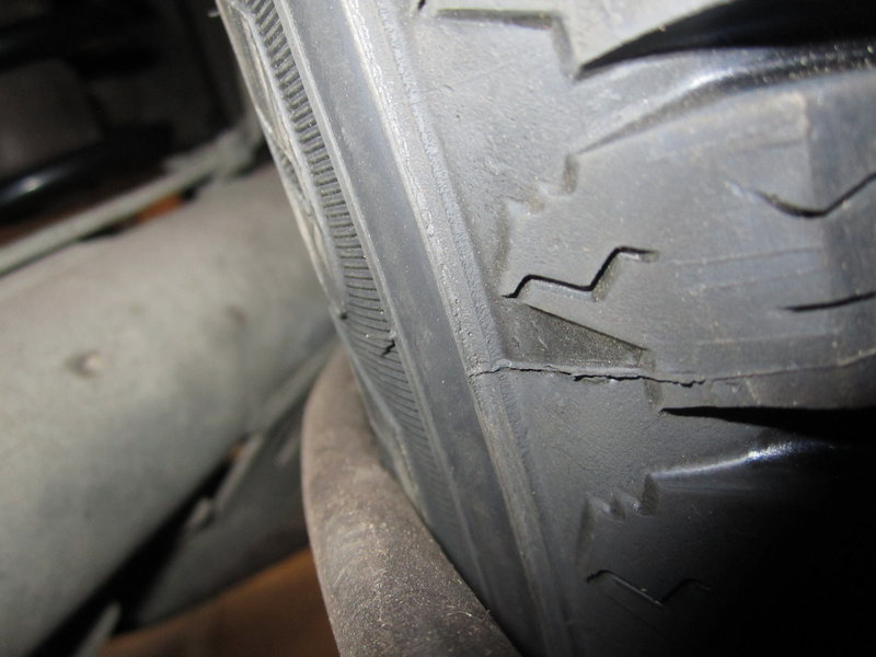 LH rear cable caught on rear tire