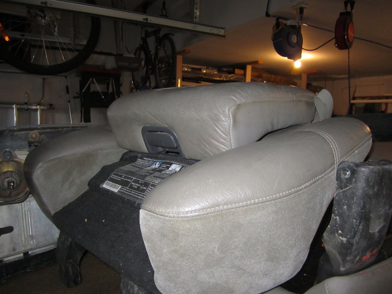 Rear seat with built in booster seat (1)