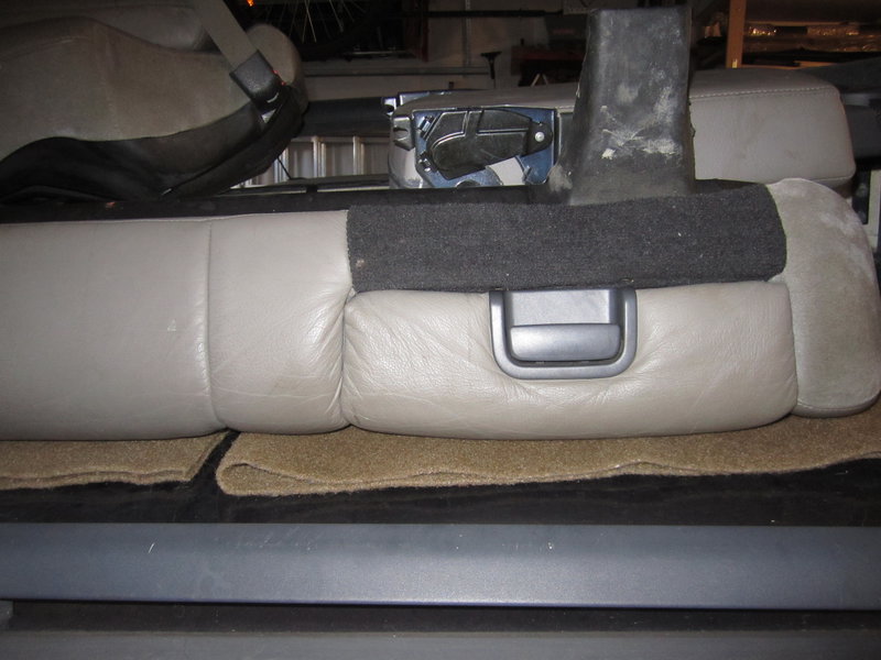 Rear seat with built in booster seat (2)