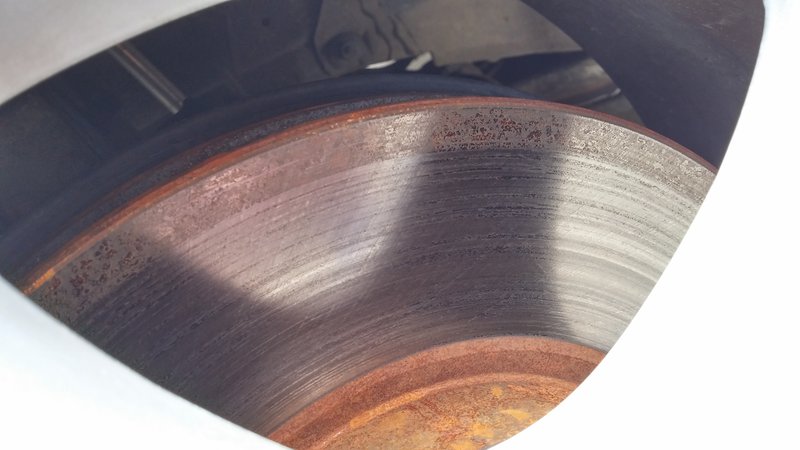 Little rust still on the rotor on driver side