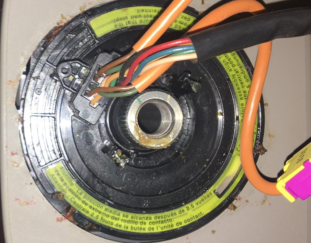 Clock Spring showing the remnants of some spilled liquid.  Seeing the mess I took more components off.
