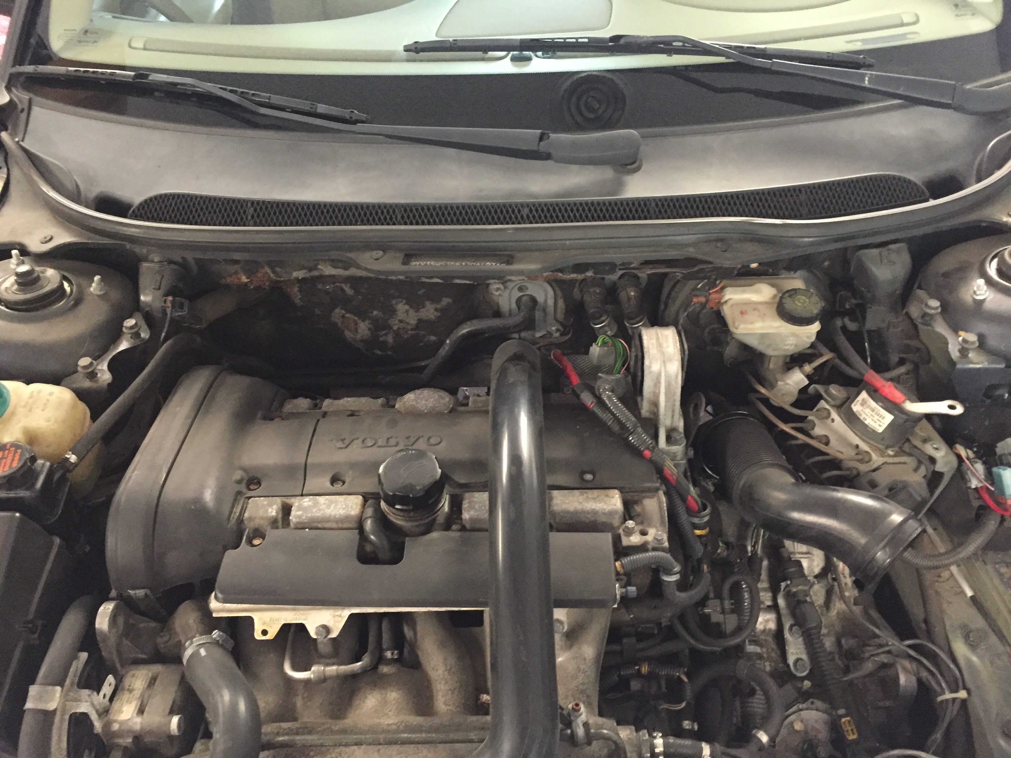 Remove strut tower brace