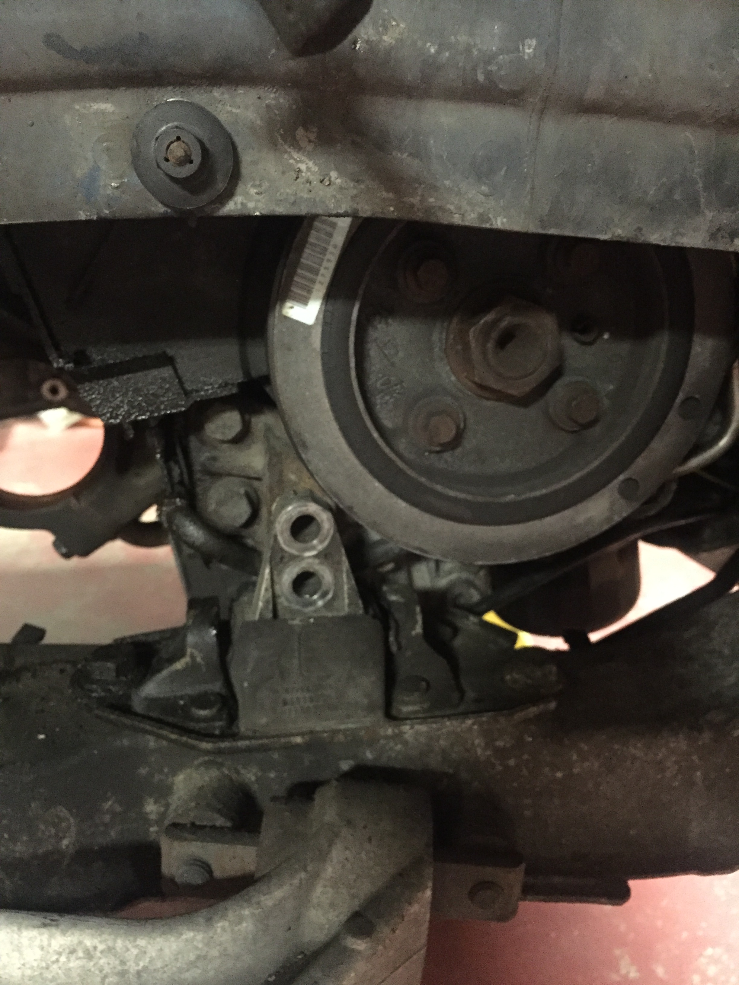 Step 39 Remove front engine mount bolts