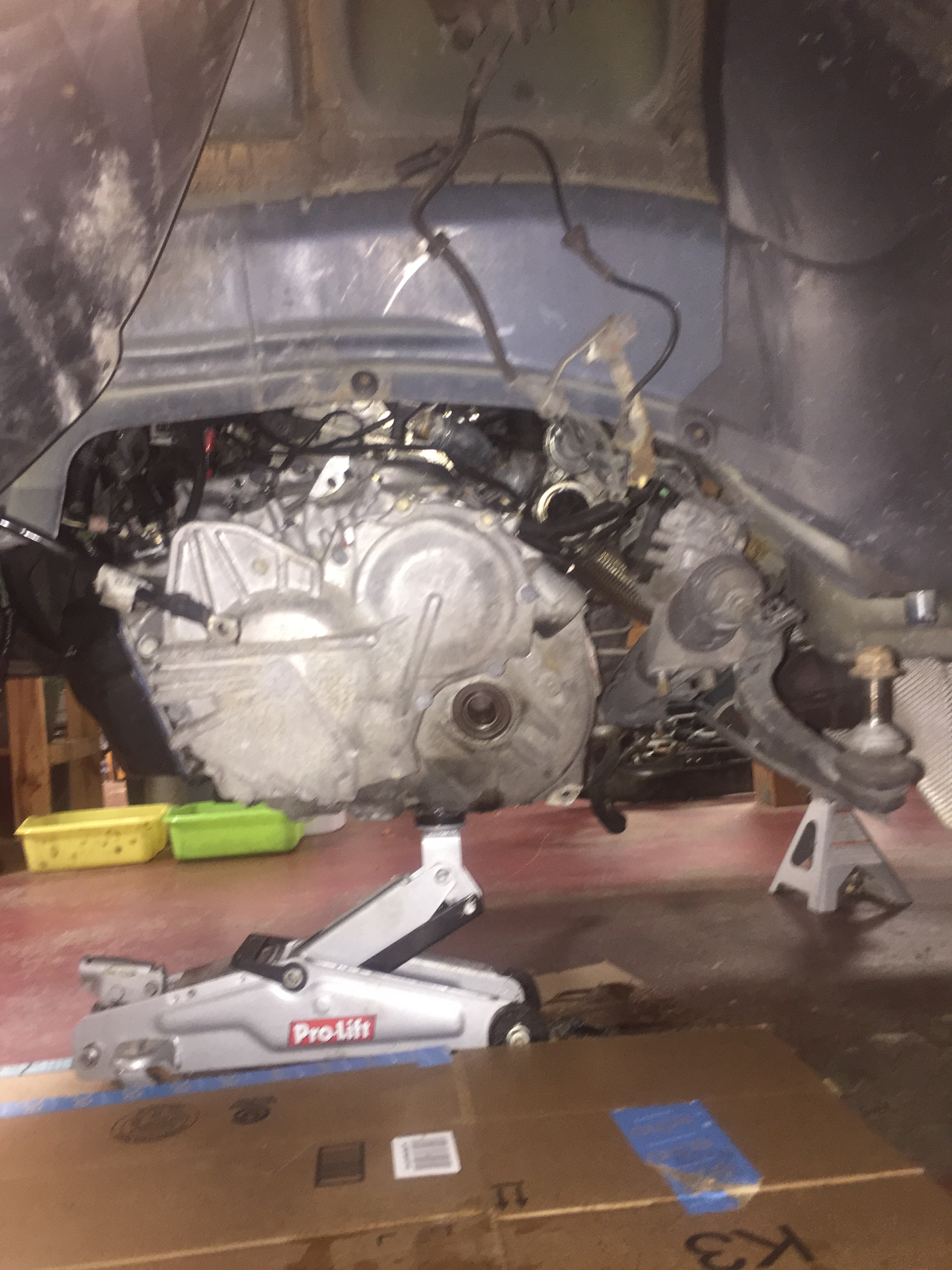 Step 50 Lower rear of engine until transmission will clear fender liner as removed