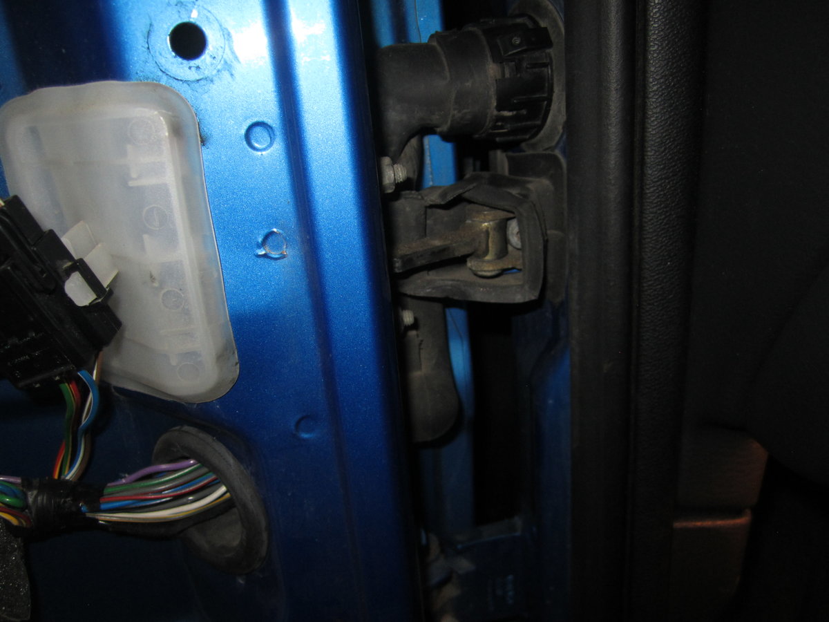 Harness where it enters the inner metal door panel