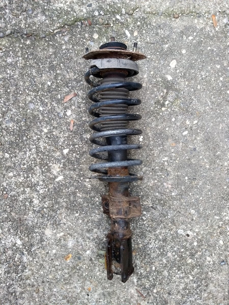 Volvo strut assembly out of a 2000 V70, likely original