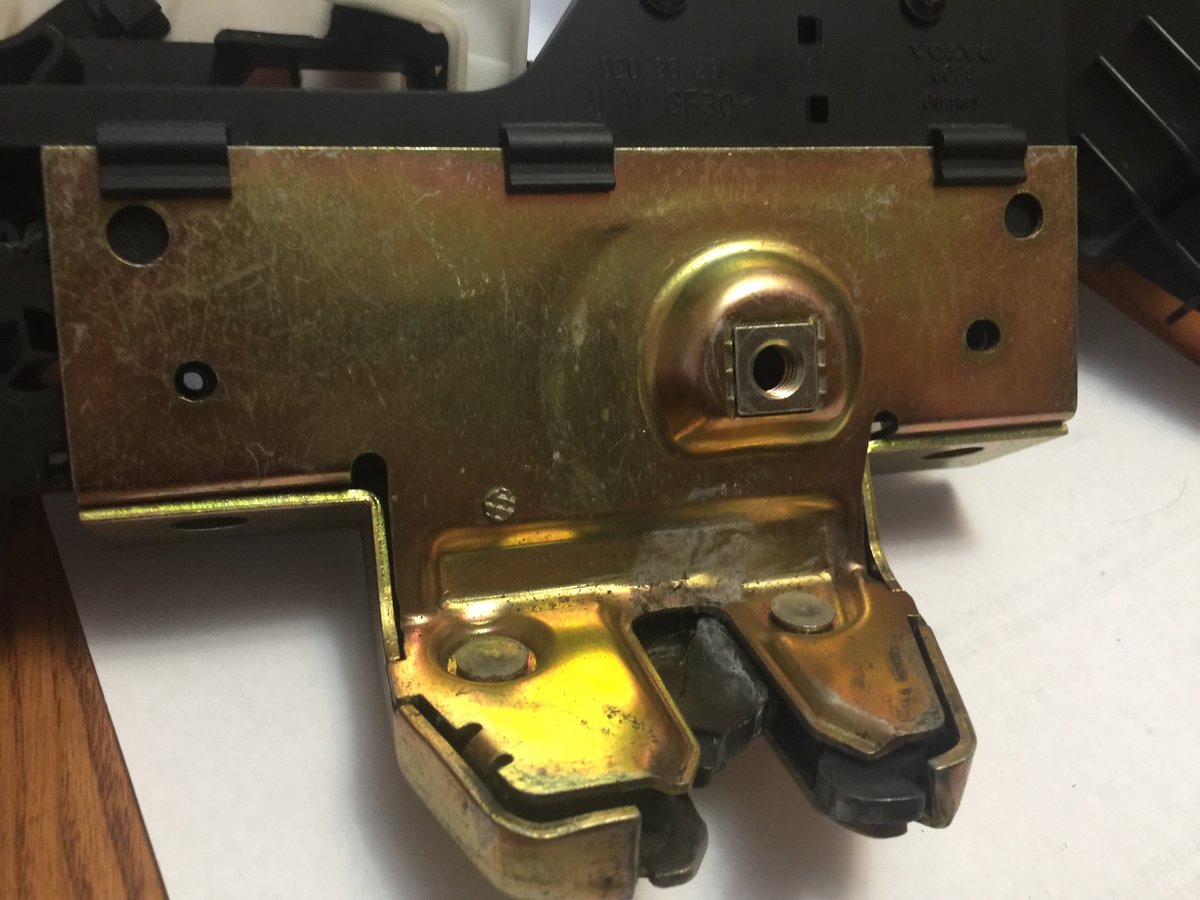 No part number on the steel part of the latch four tor screws omitted