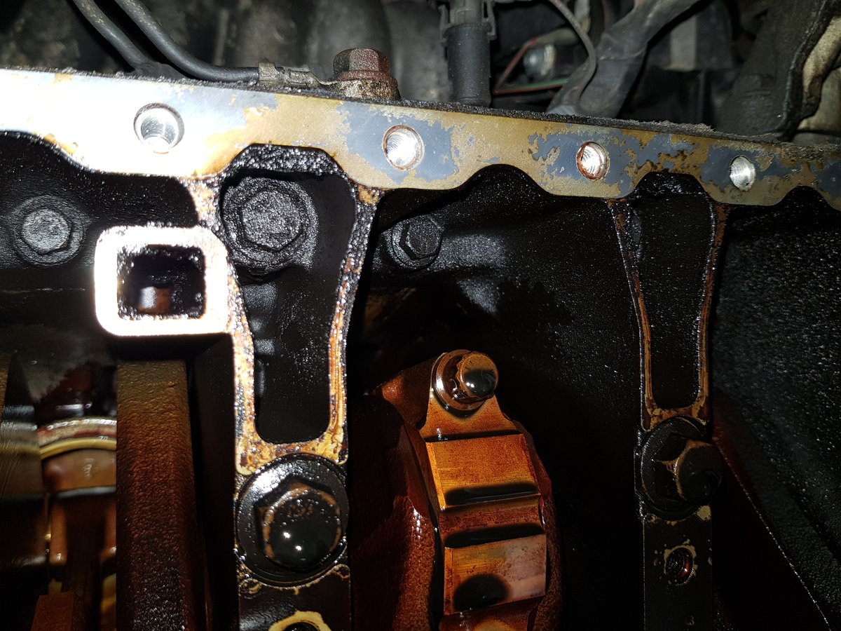 PCV port from the block looks clear enough, but I did scrape a lot of burnt oil out.