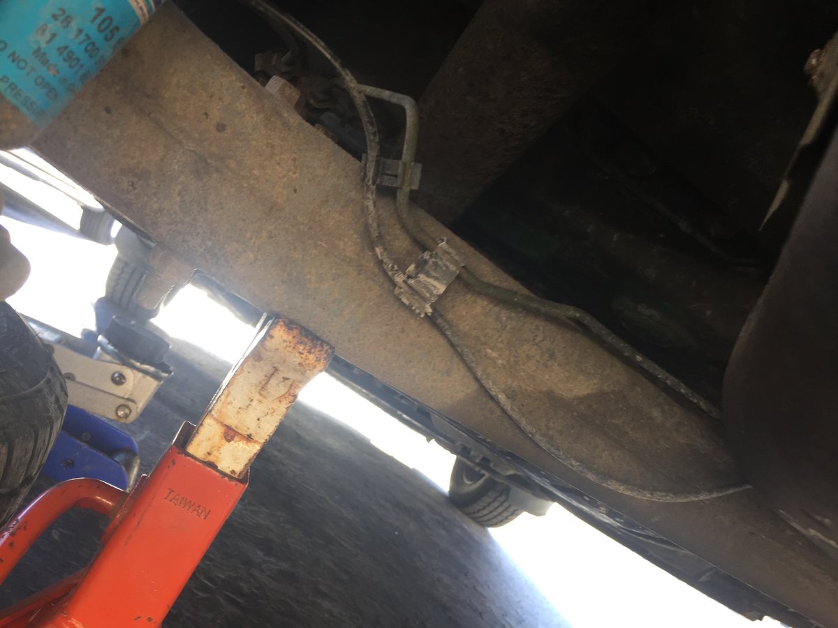 Wire over axle torsion beam