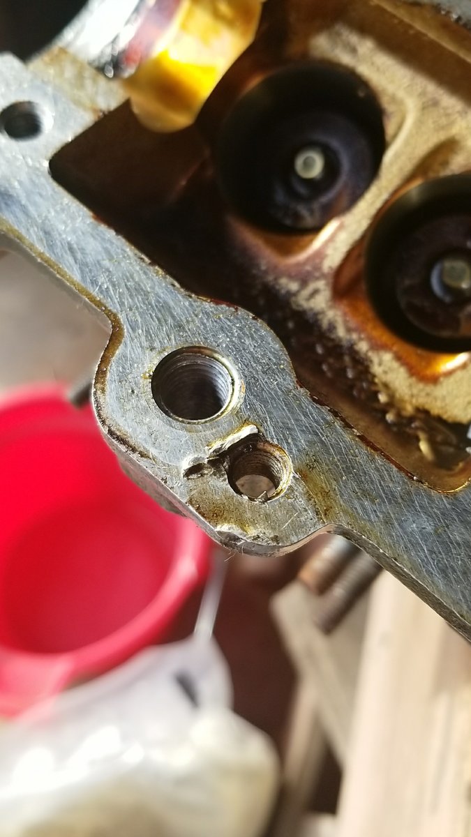 I noticed this dent/scuff in the metal, not sure whether it was there already or happened because of prying trying to get the cam cover off.