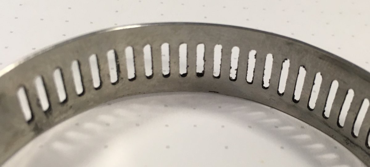 Old Hose Clamp Slots Close Up