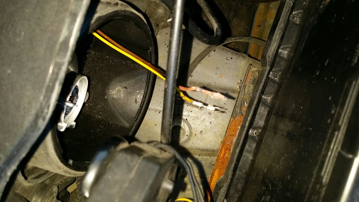 Bare wires after original adapter was removed (driver side low beam)