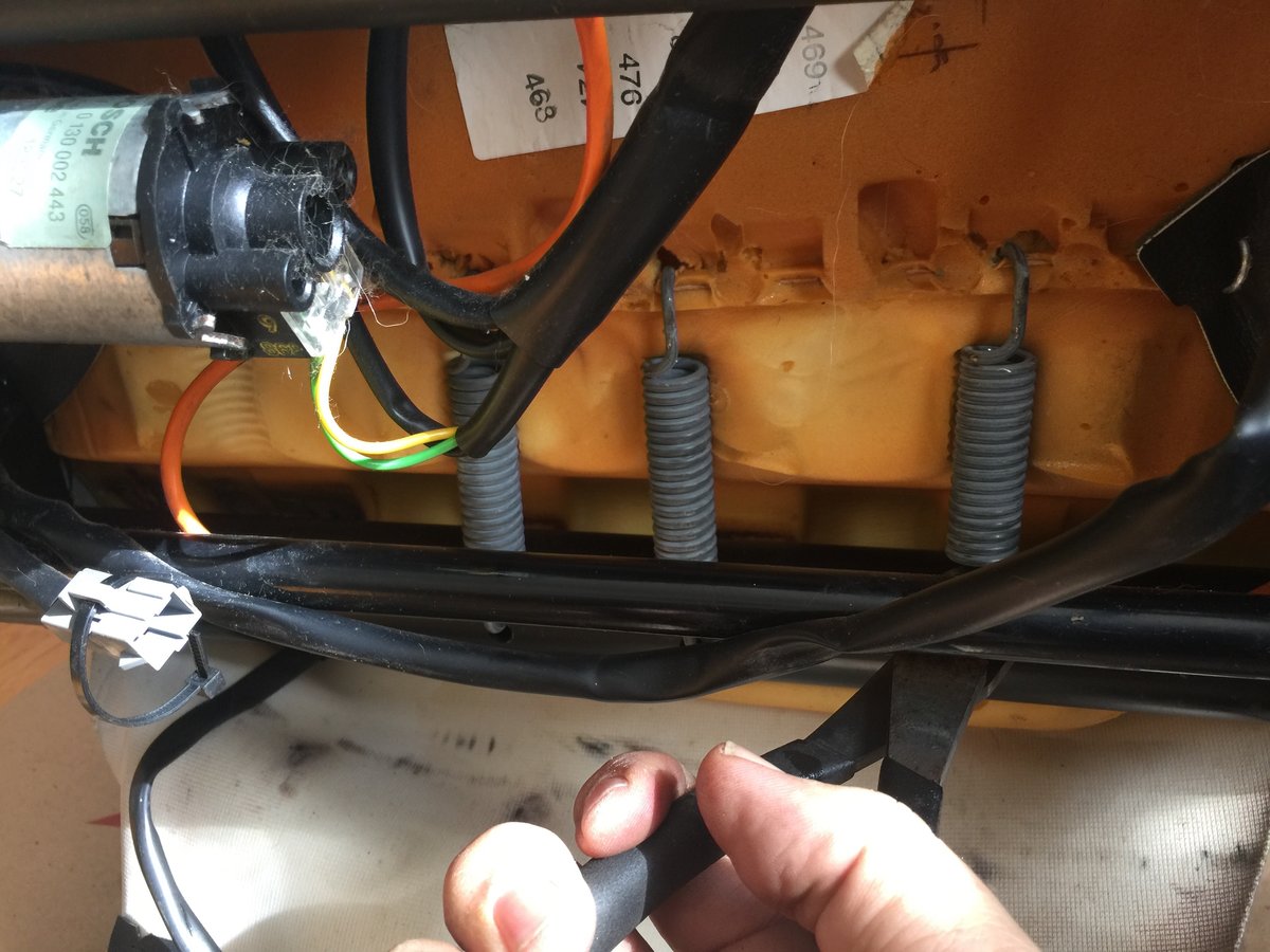 Reattaching springs on seat bottom at rear, underneath